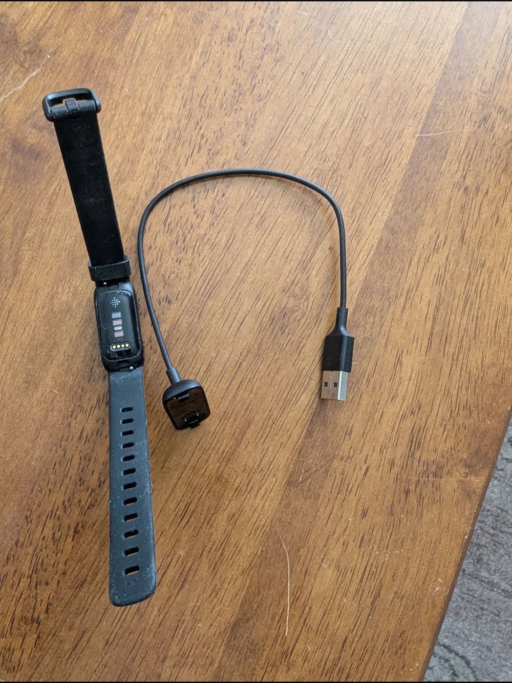 Black Fitbit Inspire Fitness Smartband with USB Charger